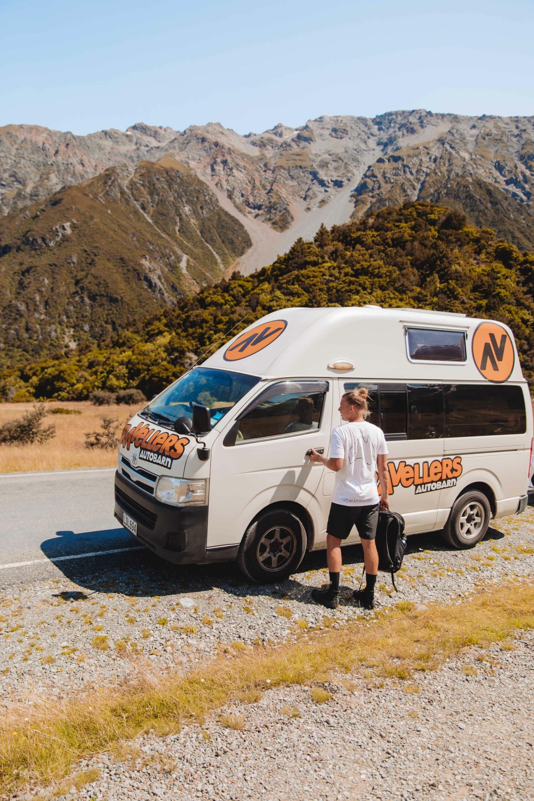 young traveller in a campervan in queenstown 